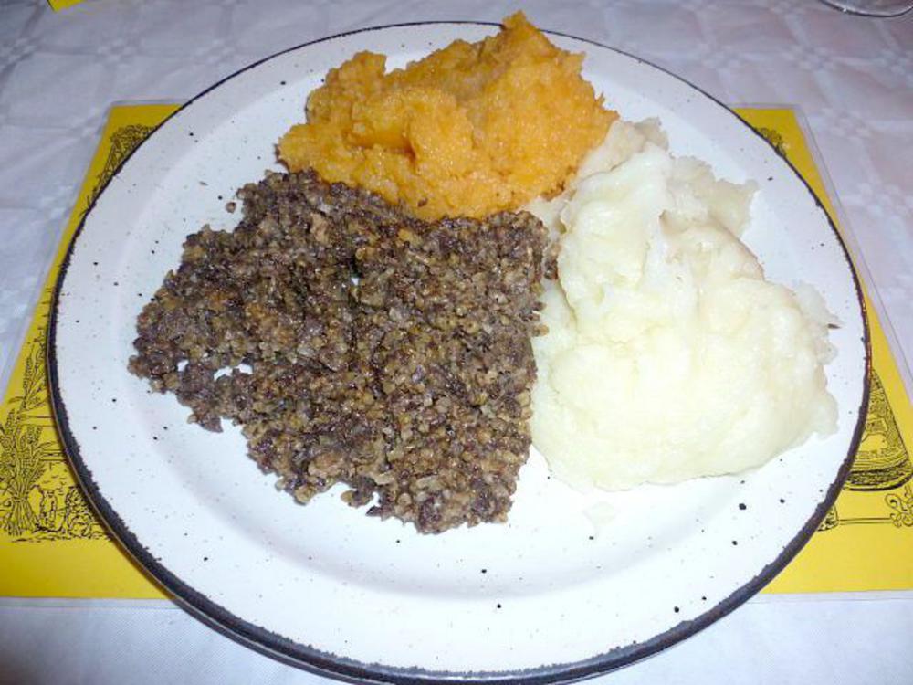 Haggis served wi tatties an neeps (with potatoes and turnips)